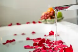 Bath With Rose Petals And Candles Photo