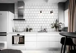 Kitchen Apron Made Of Black Tiles Photo