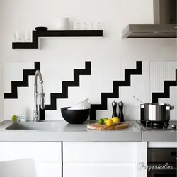 Kitchen Apron Made Of Black Tiles Photo