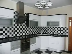 Kitchen apron made of black tiles photo