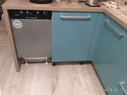 Dishwasher in the kitchen under the countertop photo