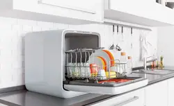 Tabletop dishwasher in the kitchen interior photo