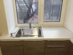 Sink in the window in the kitchen Khrushchev photo