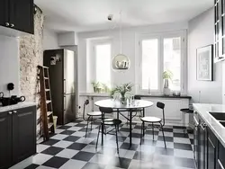 Black tiles on the kitchen floor photo