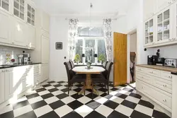 Black tiles on the kitchen floor photo