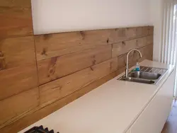 Wood-effect wall panel in the kitchen photo