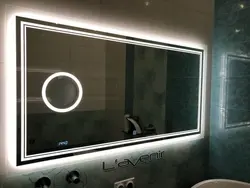 Touch-sensitive bathroom mirrors with light photo