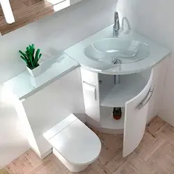 Small bathroom sink with cabinet photo