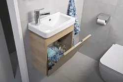 Маленькая ракавіна ў ванную з тумбай фота