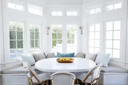 Table by the window in the kitchen living room photo