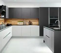 White kitchen with dark gray countertop photo