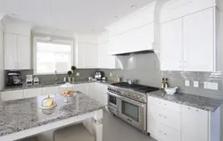 White Kitchen With Dark Gray Countertop Photo