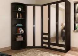 Corner wardrobe with chest of drawers in the bedroom photo