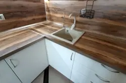 Indian wood countertop in the kitchen interior photo