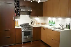 Photo of kitchen with stove and refrigerator photo