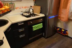 Photo of kitchen with stove and refrigerator photo