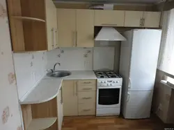 Photo Of Kitchen With Stove And Refrigerator Photo