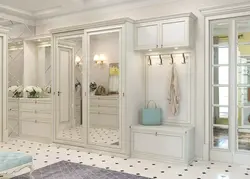 White hallway wardrobe with mirror photo