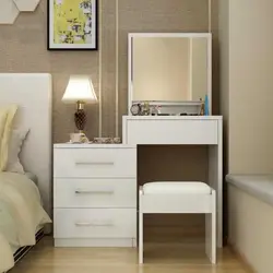 Mirror With A Nightstand In The Bedroom Photo