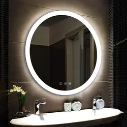 Round mirror with light in the bathroom photo