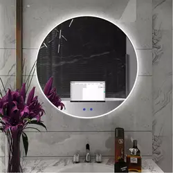 Round Mirror With Light In The Bathroom Photo