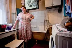 Photo of a bathtub in the kitchen in old houses