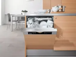 Built-in dishwasher in the kitchen interior photo