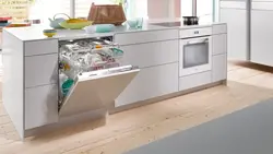 Built-in dishwasher in the kitchen interior photo