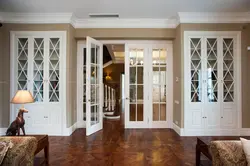 Interior double-leaf sliding doors in the living room interior photo