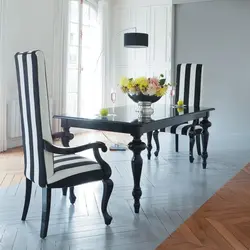 White table and black chairs for the kitchen photo