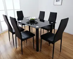Белый стол и черные стулья на кухню фото