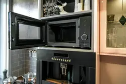 Pencil case with oven and microwave in the kitchen photo