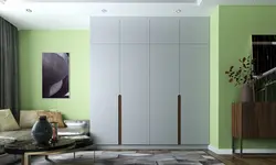 Wall-to-wall wardrobe in the living room photo