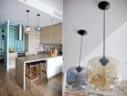 Hanging lamps above the bar counter in the kitchen photo