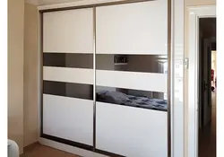Two-door wardrobe in the hallway with a mirror photo