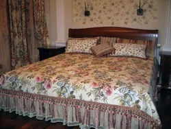 Bedspread with flowers for the bed in the bedroom photo