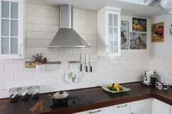 Kitchen Apron Made Of White Brick Tiles Photo
