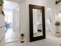 Floor-to-ceiling mirror in the hallway photo