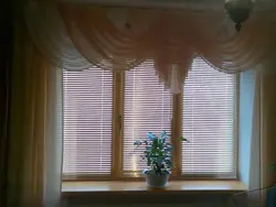 Blinds and curtains on one window in the kitchen photo