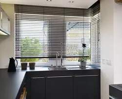 Blinds and curtains on one window in the kitchen photo