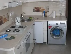 Photo of a kitchen in Khrushchev with a refrigerator and a washing machine photo