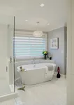 Wall-mounted bathtub in the interior