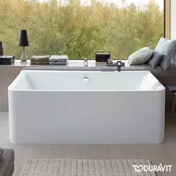 Wall-mounted bathtub in the interior