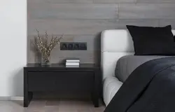 Black sockets in the bedroom interior