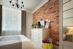 Red brick in the bedroom interior