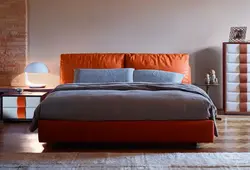 Terracotta bed in the bedroom interior