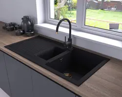 Gray sink in the kitchen interior