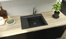 Gray sink in the kitchen interior