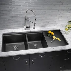 Gray sink in the kitchen interior