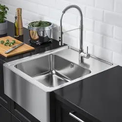 Gray sink in the kitchen interior